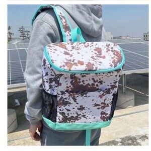 Stylish Cow Print Cooler Backpack with Aqua Accents